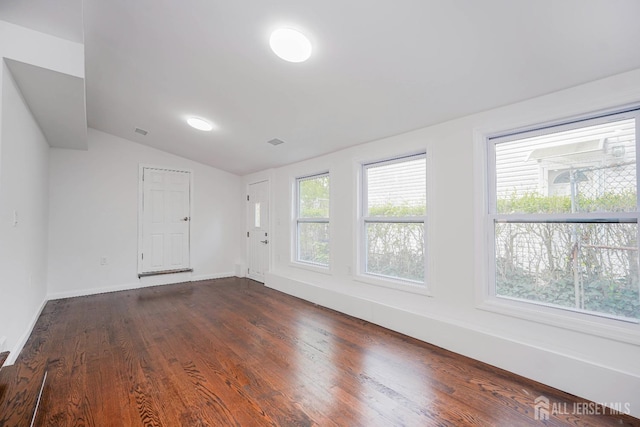 2 Buttonwood Dr, Parlin, NJ 08859 - unfurnished room featuring lofted ceiling, dark wood-style flooring, and baseboards