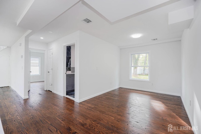 2 Buttonwood Dr, Parlin, NJ 08859 - spare room featuring plenty of natural light, dark wood finished floors, and baseboards