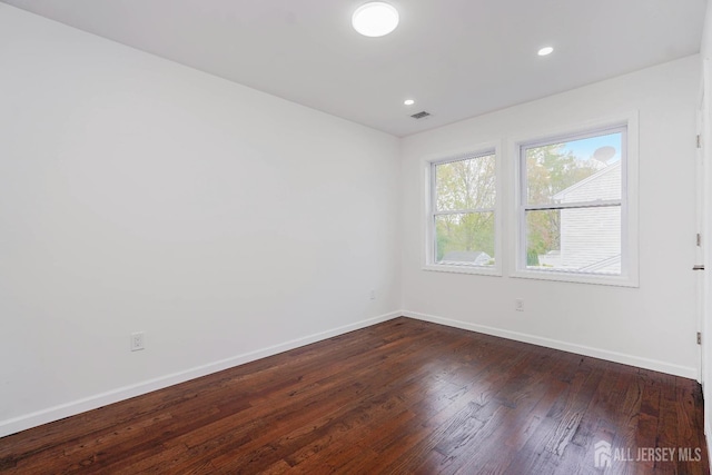 2 Buttonwood Dr, Parlin, NJ 08859 - spare room with baseboards, dark wood-style flooring, and recessed lighting