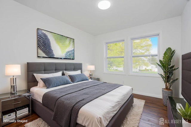 2 Buttonwood Dr, Parlin, NJ 08859 - bedroom with wood finished floors and baseboards