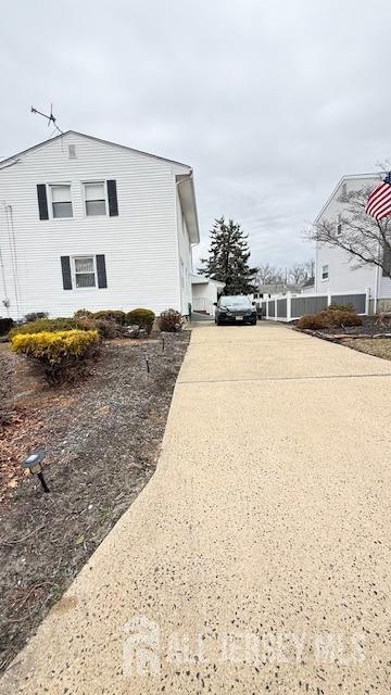 view of home's exterior with driveway