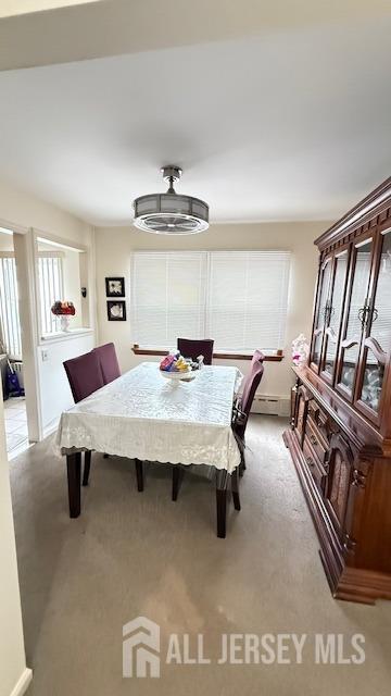 dining room with carpet flooring