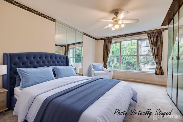 78 Central Ave Unit 49, Metuchen, NJ 08840 - bedroom featuring light colored carpet and a ceiling fan
