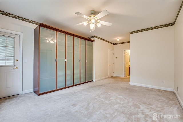 78 Central Ave Unit 49, Metuchen, NJ 08840 - spare room with a ceiling fan, light carpet, and baseboards