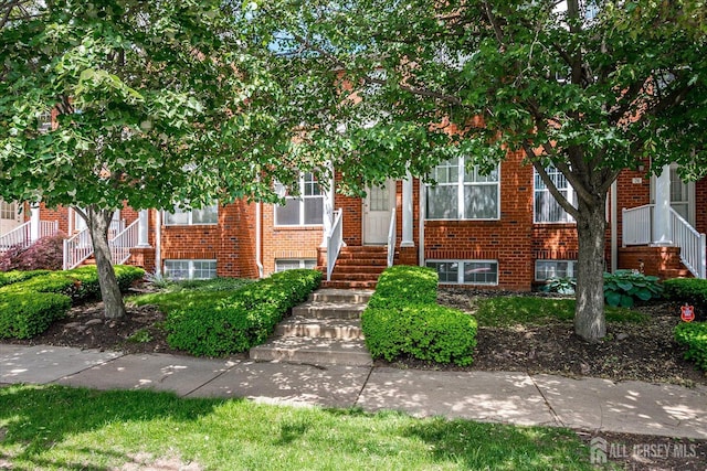 78 Central Ave Unit 49, Metuchen, NJ 08840 - obstructed view of property with stairway and brick siding