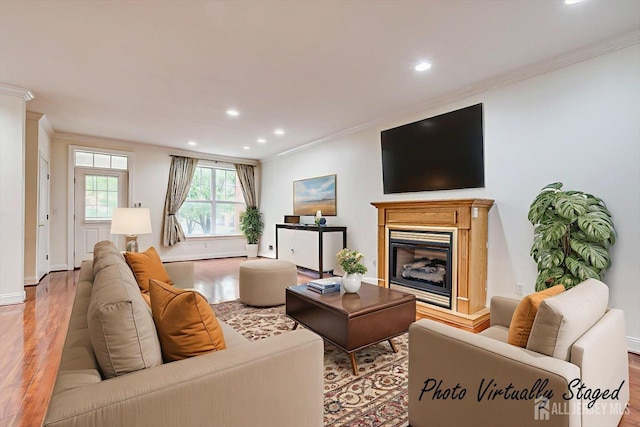 78 Central Ave Unit 49, Metuchen, NJ 08840 - living room with crown molding, wood finished floors, a fireplace, recessed lighting, and baseboards