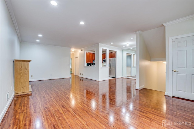 78 Central Ave Unit 49, Metuchen, NJ 08840 - unfurnished living room with ornamental molding, wood finished floors, recessed lighting, and baseboards