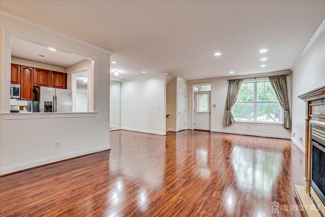 78 Central Ave Unit 49, Metuchen, NJ 08840 - unfurnished living room with a fireplace, wood finished floors, ornamental molding, and recessed lighting