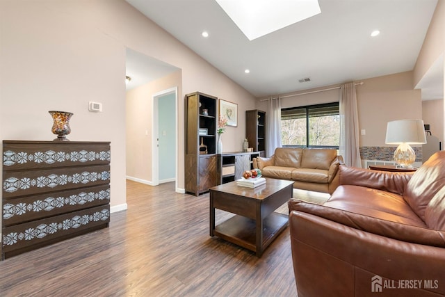 144-C Overlook Ct Unit C, Woodbridge Proper, NJ 07095 - living room with lofted ceiling, wood finished floors, a skylight, baseboards, and recessed lighting