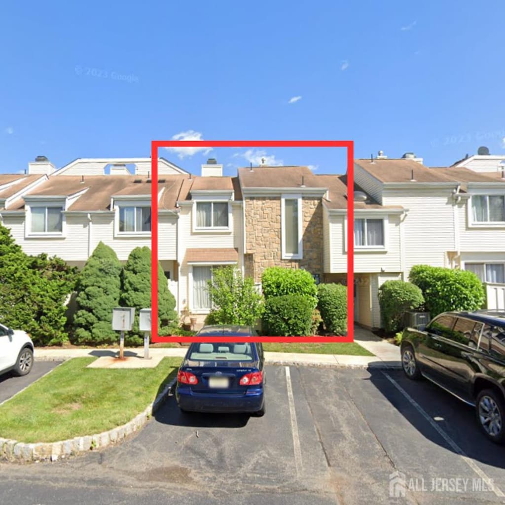 1086 Schmidt Ln, North Brunswick, NJ 08902 - view of property featuring uncovered parking