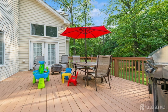5 Ramapo Ct, Colts Neck, NJ 07722 - deck with outdoor dining space and a fire pit