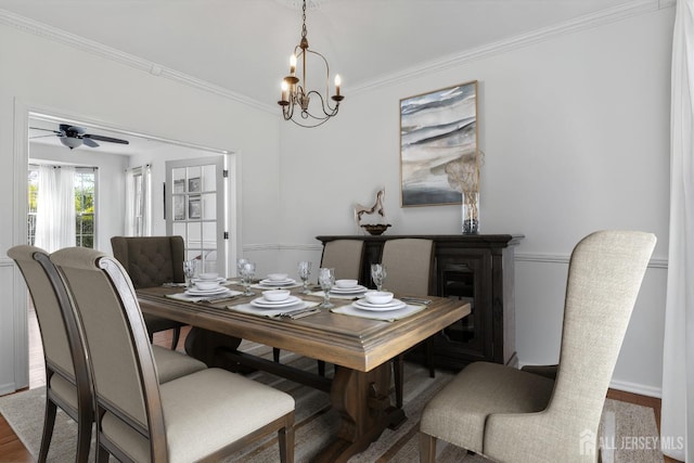 16 Exeter Pass, Colts Neck, NJ 07722 - dining room featuring crown molding, wood finished floors, a chandelier, and ceiling fan
