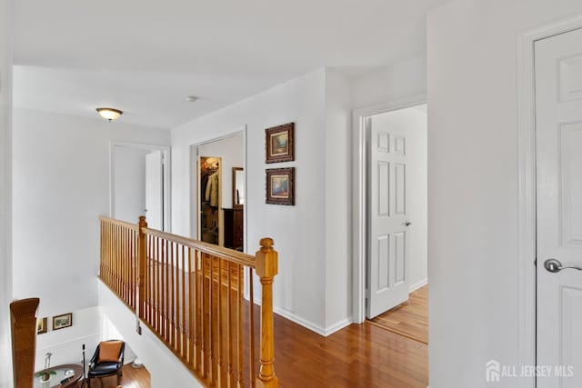 16 Exeter Pass, Colts Neck, NJ 07722 - hall featuring an upstairs landing and wood finished floors