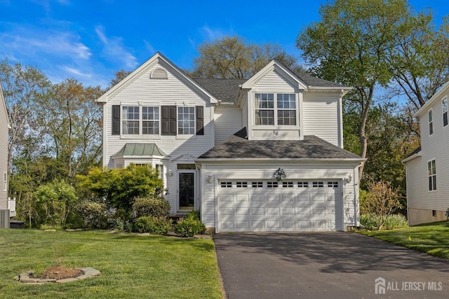 16 Exeter Pass, Colts Neck, NJ 07722 - traditional home with driveway, a front yard, a garage, and roof with shingles