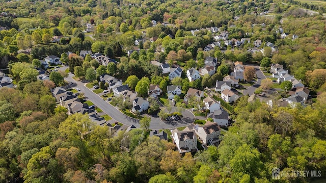 16 Exeter Pass, Colts Neck, NJ 07722 - aerial view of property and surrounding area featuring a forest and nearby suburban area
