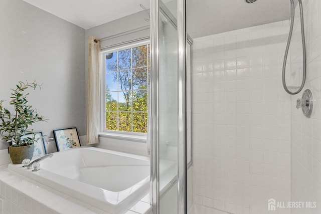 16 Exeter Pass, Colts Neck, NJ 07722 - bathroom with a stall shower, healthy amount of natural light, and a garden tub