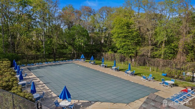16 Exeter Pass, Colts Neck, NJ 07722 - community pool featuring a patio and fence