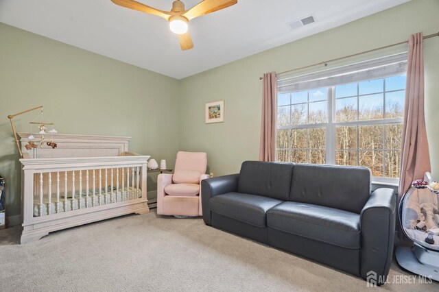 bedroom featuring carpet floors and ceiling fan