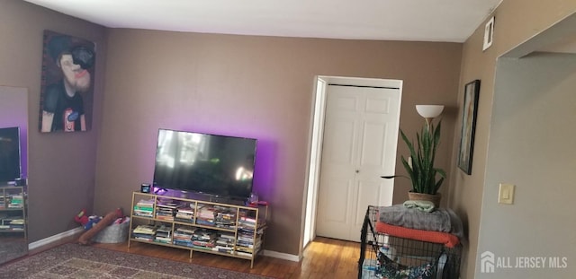 197 Evergreen Rd Unit 3A, Edison, NJ 08837 - living area with wood finished floors and baseboards