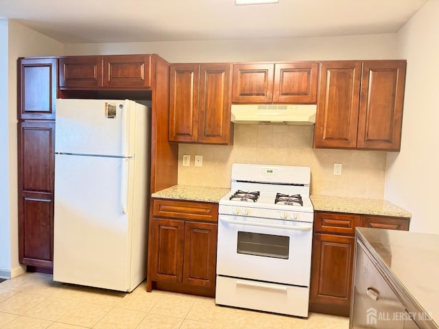 832 Edpas Rd, New Brunswick, NJ 08901 - kitchen featuring white appliances, under cabinet range hood, tasteful backsplash, and light stone counters