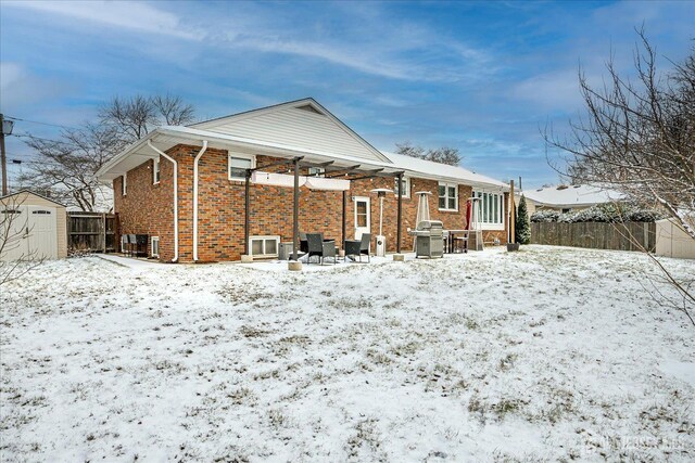 view of snow covered house