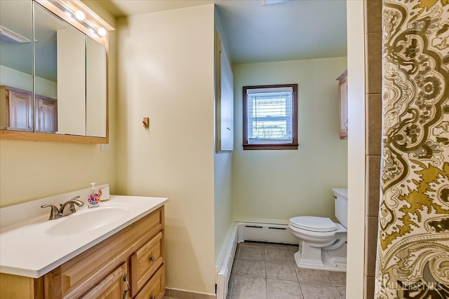 bathroom with tile patterned floors, toilet, a baseboard heating unit, and vanity