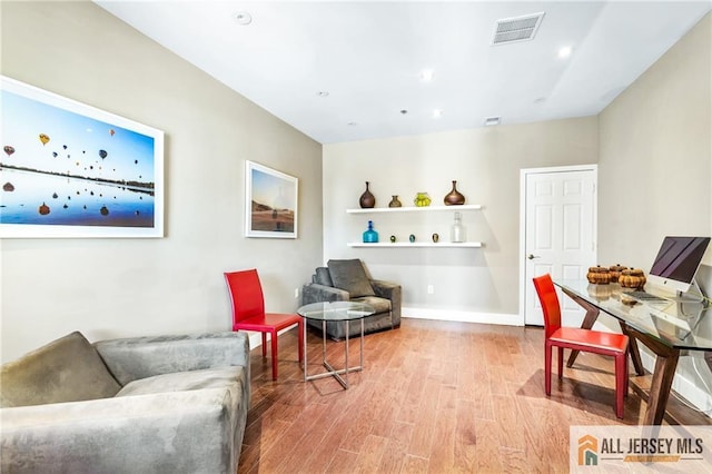 448 Tower Blvd Unit 448, Piscataway, NJ 08854 - living area featuring wood finished floors, recessed lighting, and baseboards