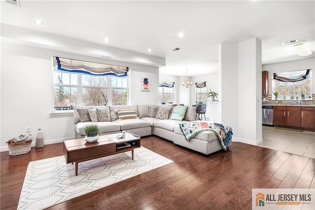 448 Tower Blvd Unit 448, Piscataway, NJ 08854 - living room featuring wood finished floors, a chandelier, and recessed lighting