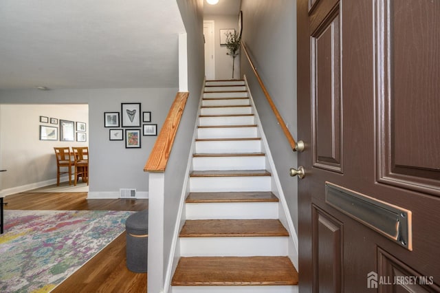 245 Newman St, Metuchen, NJ 08840 - stairs with wood finished floors and baseboards