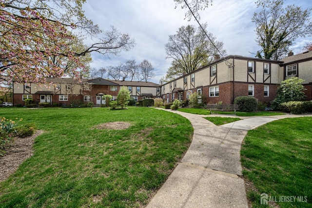 245 Newman St, Metuchen, NJ 08840 - surrounding community featuring a lawn and a residential view