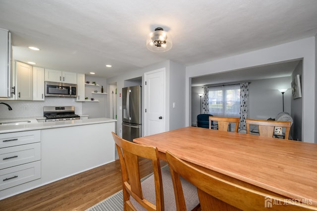 245 Newman St, Metuchen, NJ 08840 - dining room featuring dark wood-type flooring and recessed lighting