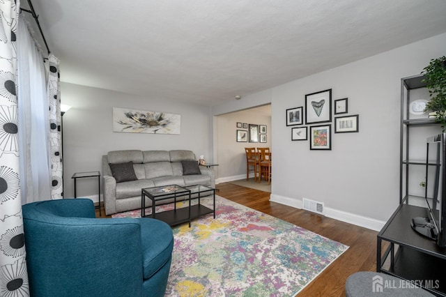 245 Newman St, Metuchen, NJ 08840 - living area with wood finished floors and baseboards