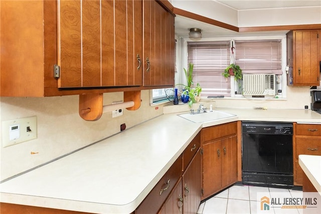 kitchen with light tile patterned flooring, a sink, light countertops, dishwasher, and brown cabinetry