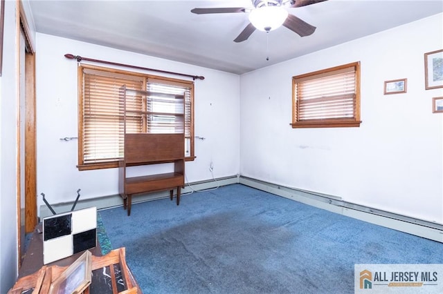 interior space with a baseboard radiator, carpet flooring, and a ceiling fan