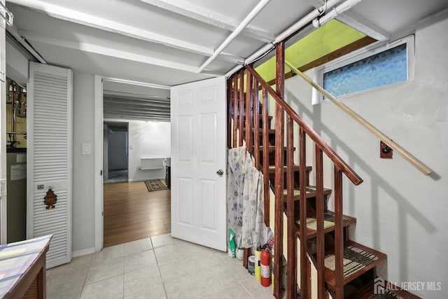 365 E John St, South Amboy, NJ 08879 - stairway featuring tile patterned flooring and baseboards