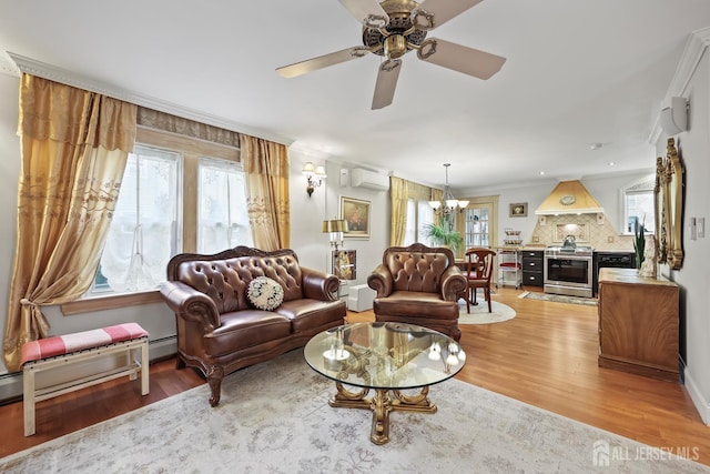 365 E John St, South Amboy, NJ 08879 - living area featuring a wall mounted air conditioner, a chandelier, light wood-type flooring, and ceiling fan