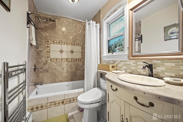 365 E John St, South Amboy, NJ 08879 - full bath with tiled shower / bath combo, toilet, vanity, radiator heating unit, and decorative backsplash