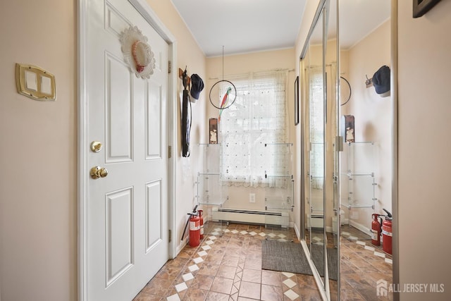 365 E John St, South Amboy, NJ 08879 - doorway to outside with baseboard heating and light tile patterned floors