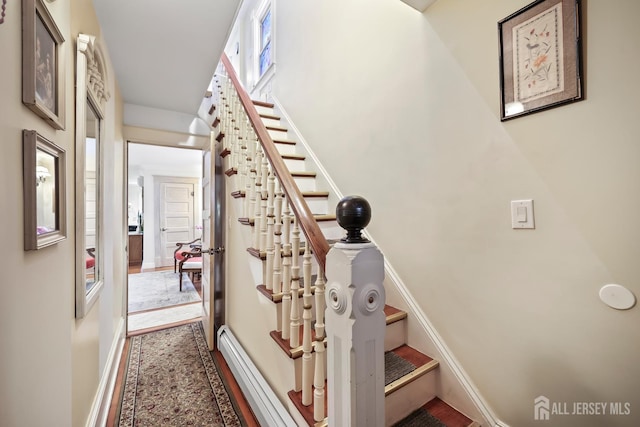 365 E John St, South Amboy, NJ 08879 - staircase with baseboards and wood finished floors
