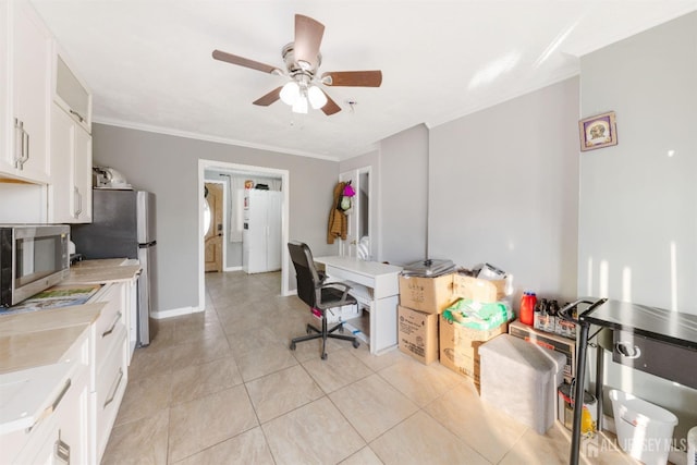 tiled home office with crown molding and ceiling fan