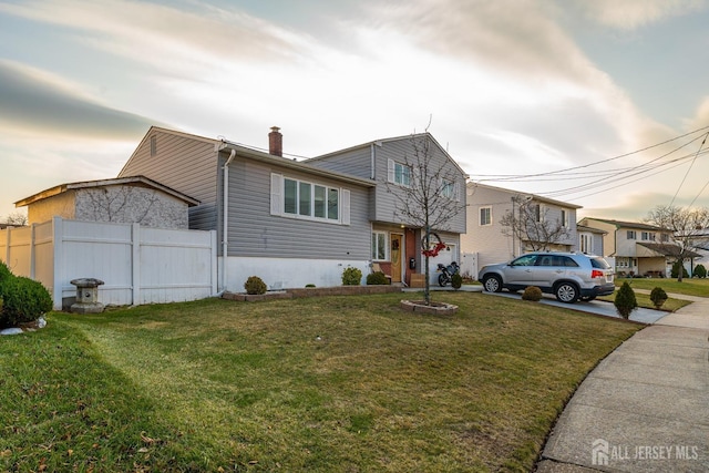 view of front of house with a front lawn