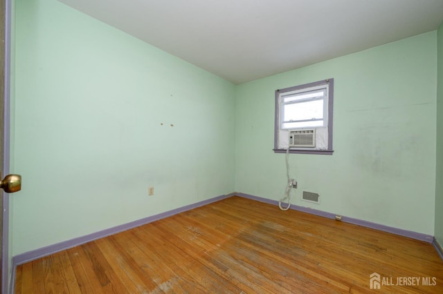 unfurnished room featuring light wood-type flooring