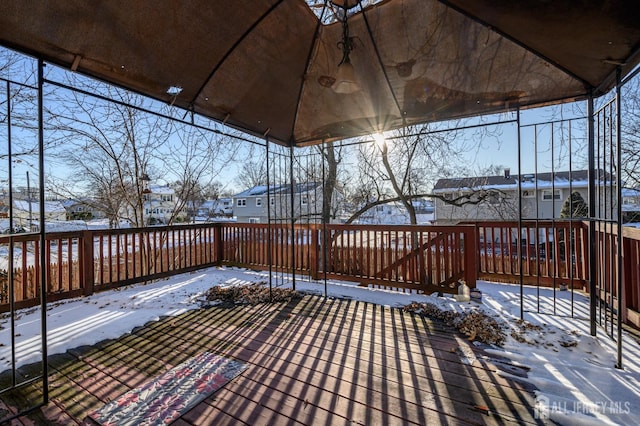 view of snow covered deck