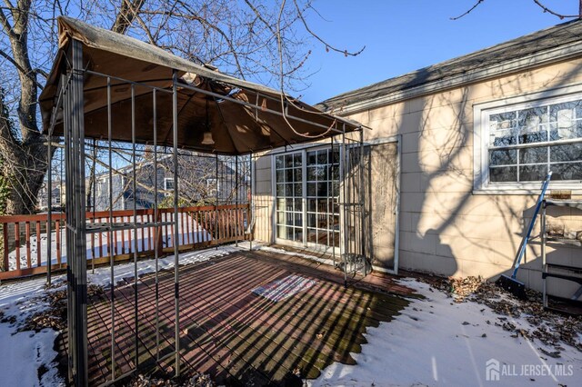 view of snow covered deck