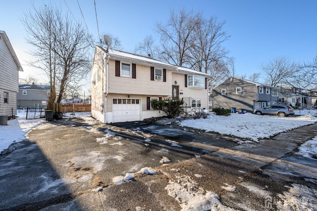 bi-level home featuring a garage