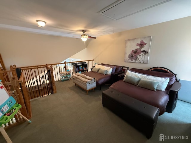 carpeted bedroom featuring attic access