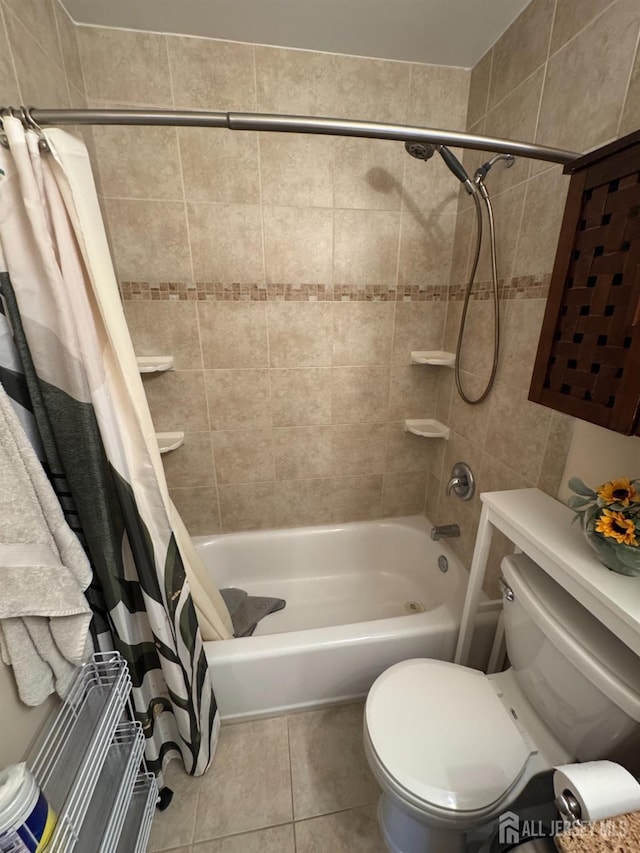 full bathroom featuring shower / bath combo, toilet, and tile patterned flooring