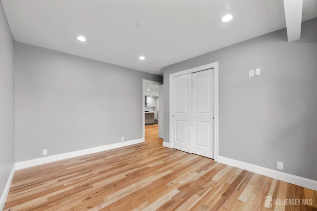 13 Lauretta Dr, East Brunswick, NJ 08816 - unfurnished bedroom featuring wood finished floors, a closet, and recessed lighting
