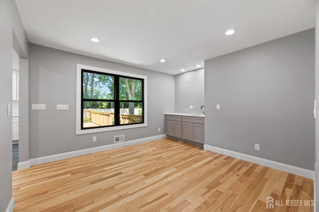13 Lauretta Dr, East Brunswick, NJ 08816 - unfurnished room featuring light wood-style floors and recessed lighting