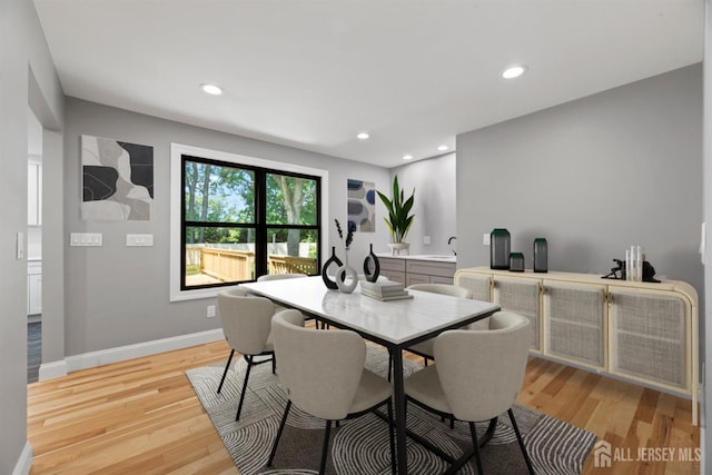 13 Lauretta Dr, East Brunswick, NJ 08816 - dining space with light wood-style flooring and recessed lighting